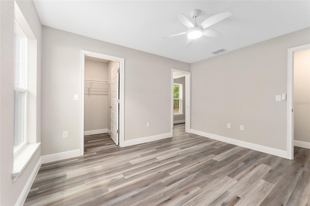 4444 SW 118th Ter, Ocala, FL 34481 - unfurnished bedroom with light wood-type flooring, baseboards, and a closet