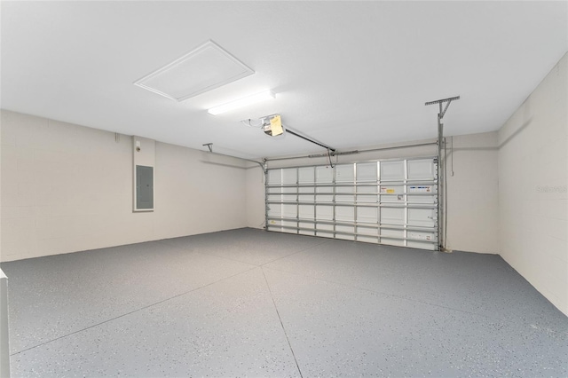 4444 SW 118th Ter, Ocala, FL 34481 - garage with electric panel and a garage door opener