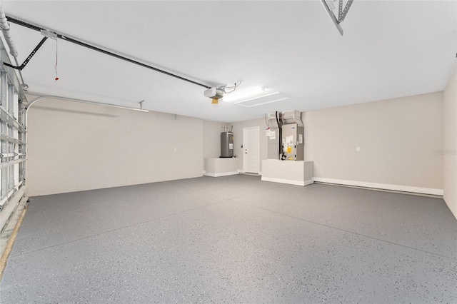 4444 SW 118th Ter, Ocala, FL 34481 - garage with a garage door opener, electric water heater, and heating unit