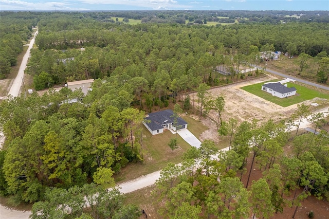4444 SW 118th Ter, Ocala, FL 34481 - aerial view of property and surrounding area with a heavily wooded area