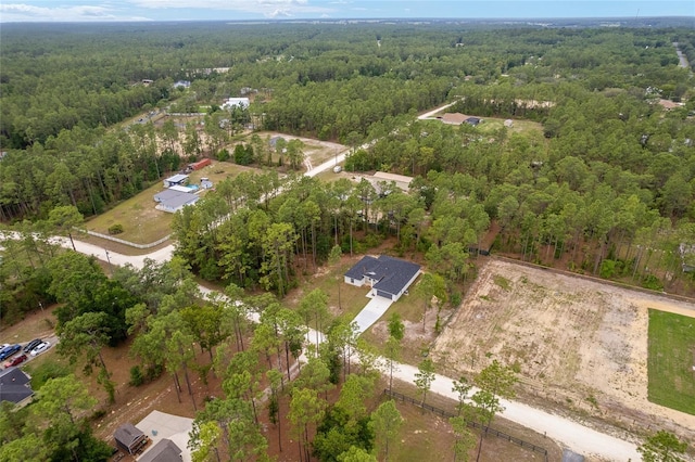 4444 SW 118th Ter, Ocala, FL 34481 - aerial view of property and surrounding area with a heavily wooded area