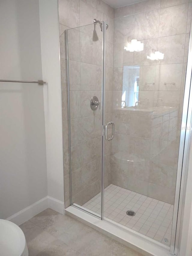 bathroom featuring walk in shower