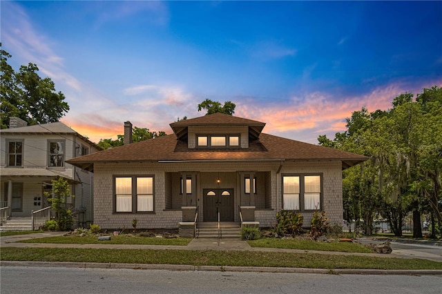 view of front of property featuring covered porch