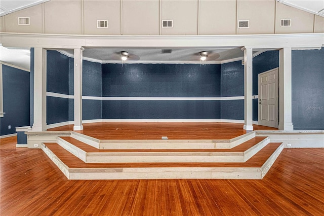 interior space featuring lofted ceiling and hardwood / wood-style floors