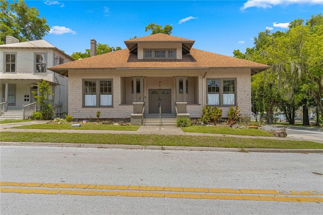 bungalow-style home featuring covered porch