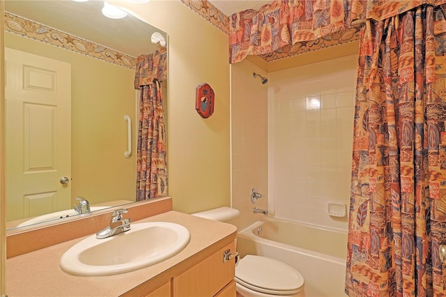 full bathroom with shower / bathtub combination with curtain, vanity, and toilet