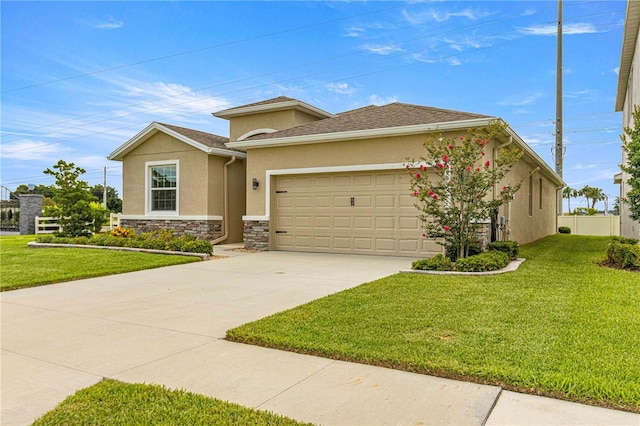 view of front facade featuring a front lawn and a garage