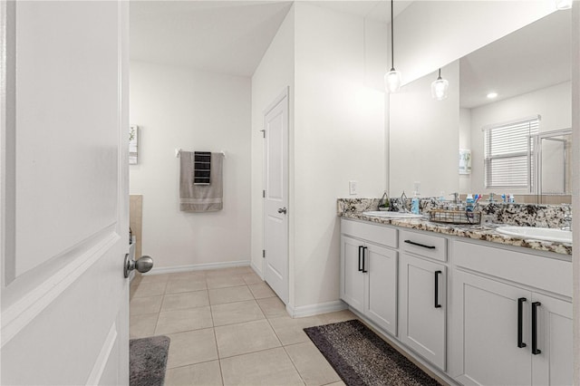 bathroom with vanity and tile patterned flooring