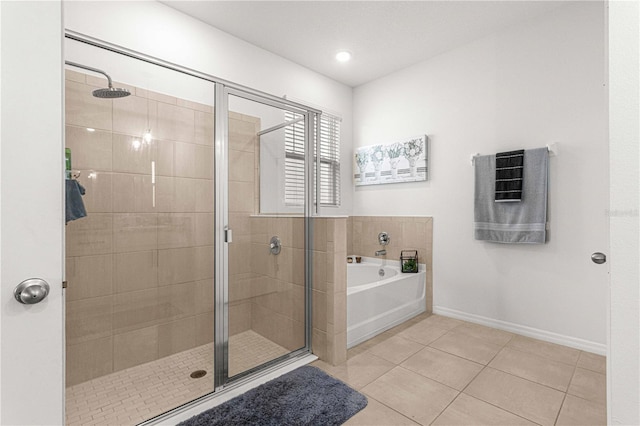 bathroom featuring tile patterned floors and plus walk in shower