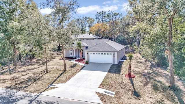 view of front of property with a garage