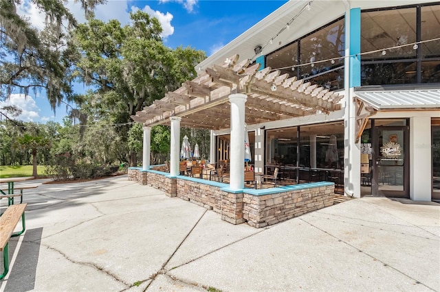 view of patio / terrace featuring a pergola