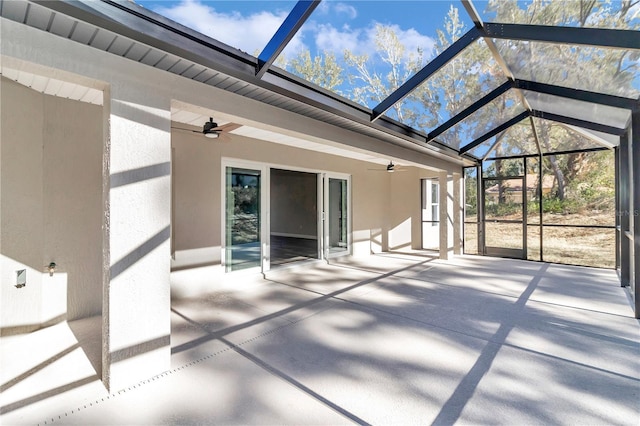 unfurnished sunroom featuring lofted ceiling