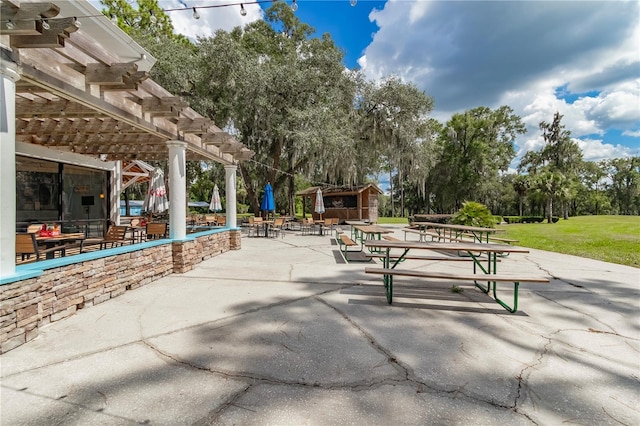 view of patio / terrace featuring a pergola