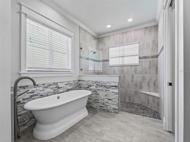 bathroom with shower with separate bathtub, tile patterned floors, and plenty of natural light