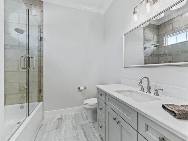 full bathroom featuring vanity, tile patterned floors, combined bath / shower with glass door, crown molding, and toilet