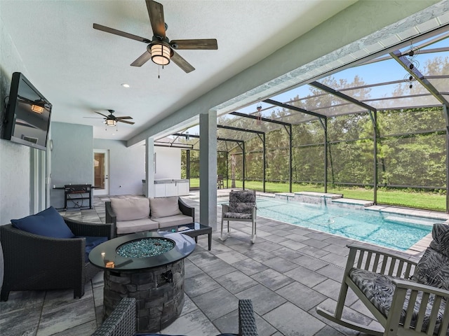 exterior space featuring a lanai, an outdoor hangout area, and ceiling fan