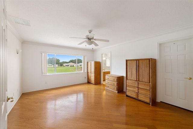 unfurnished bedroom featuring ornamental molding, light hardwood / wood-style floors, and ceiling fan