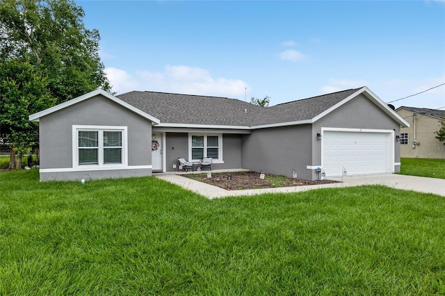 ranch-style home featuring a front lawn and a garage