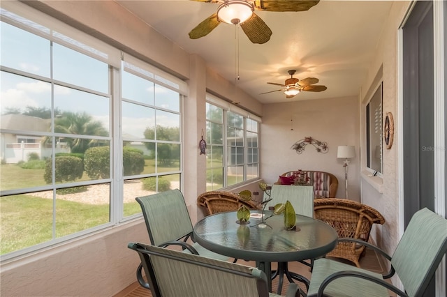 sunroom / solarium with ceiling fan