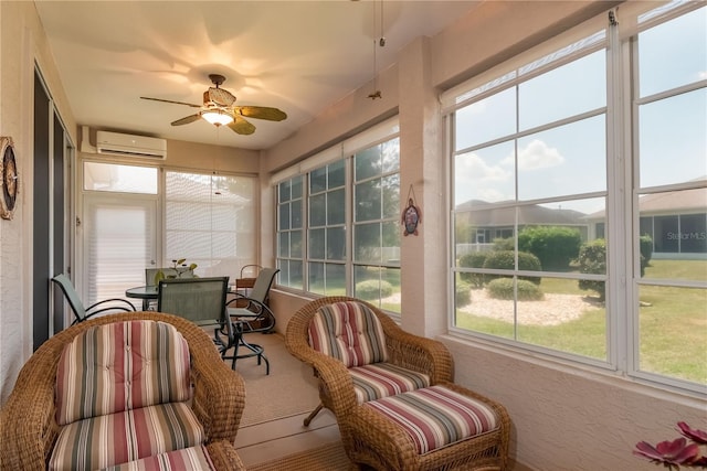 sunroom featuring ceiling fan and a wall mounted AC