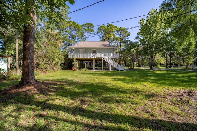 view of yard featuring covered porch