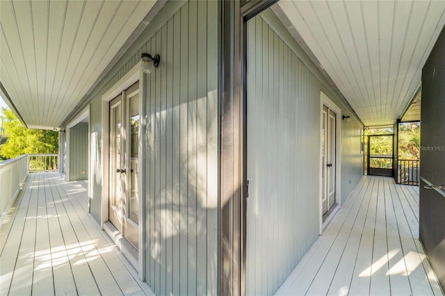 wooden deck featuring covered porch