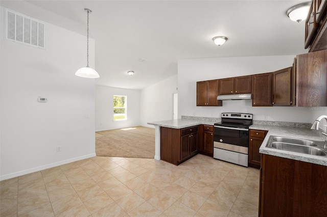 kitchen featuring electric range, lofted ceiling, kitchen peninsula, light colored carpet, and sink