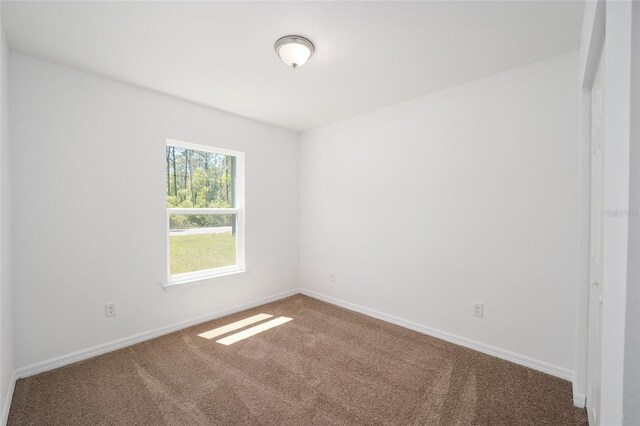 view of carpeted spare room