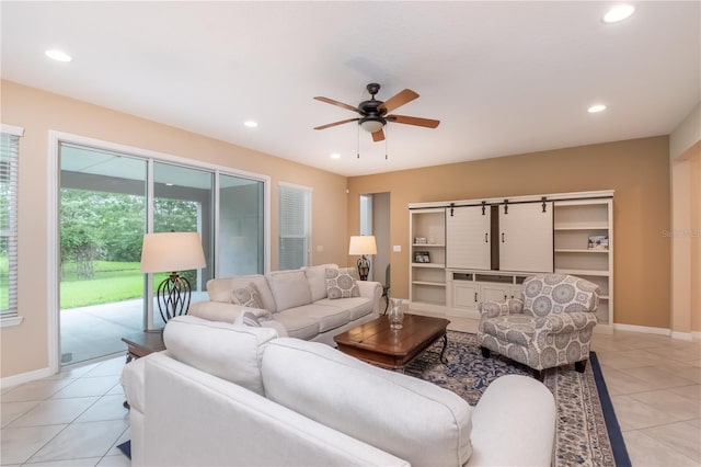 tiled living room with ceiling fan