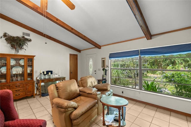 living room with light tile patterned flooring, lofted ceiling with beams, and ceiling fan