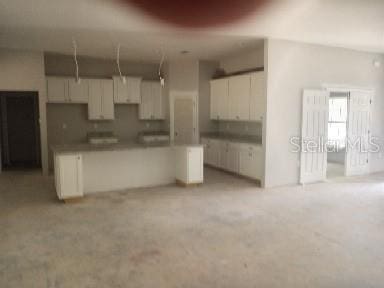 kitchen featuring white cabinetry