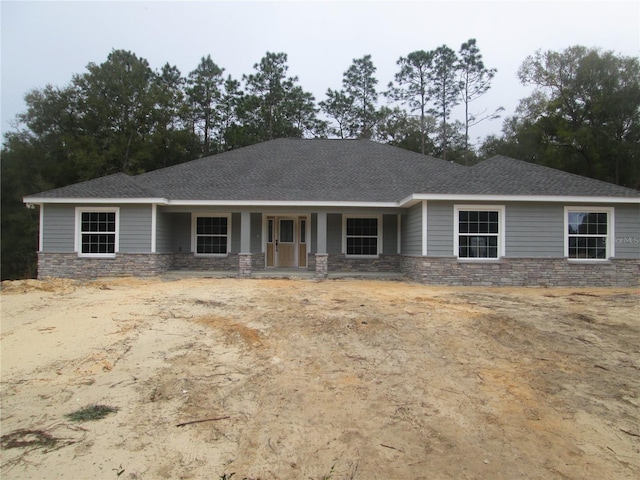 view of front of property featuring covered porch