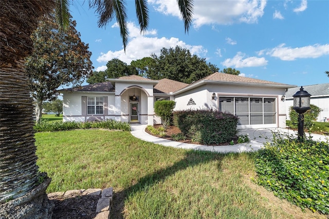 view of front of home with a front lawn