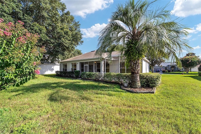 exterior space with a front lawn