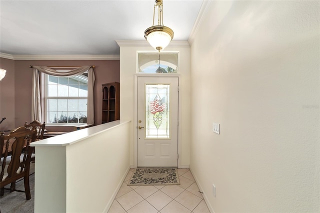 tiled entrance foyer with ornamental molding