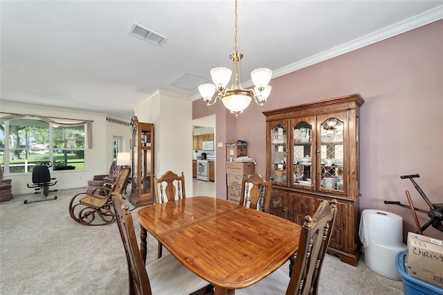 dining area featuring light colored carpet, ornamental molding, and an inviting chandelier