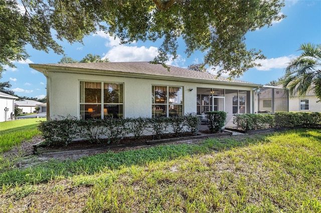 view of front of property with a front lawn