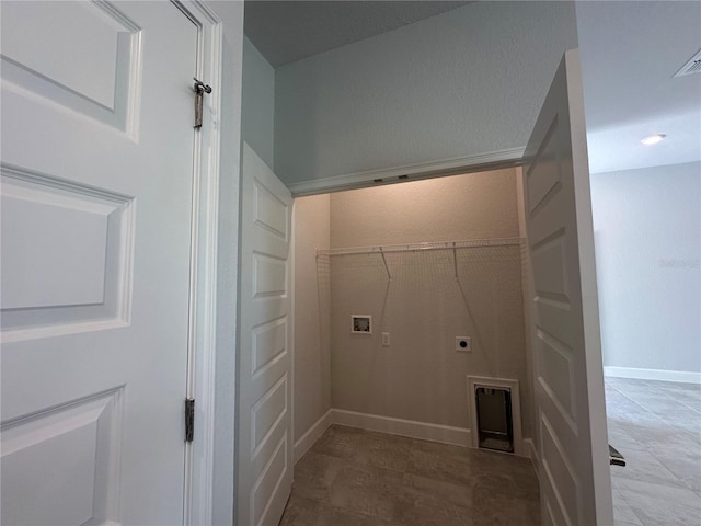 laundry room with electric dryer hookup, baseboards, hookup for a washing machine, and laundry area