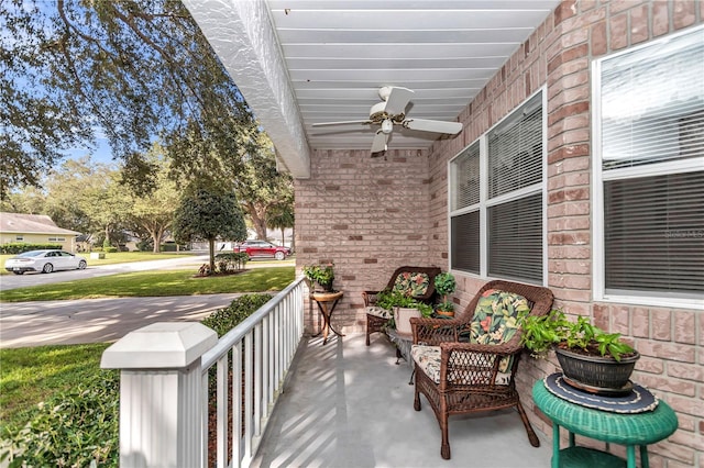 view of patio with a porch and ceiling fan