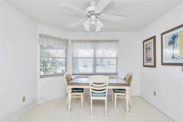 dining space featuring ceiling fan