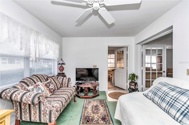 living room with ceiling fan