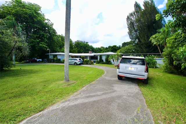 exterior space featuring a front lawn