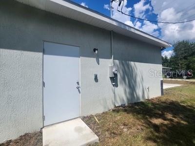 view of entry to storm shelter