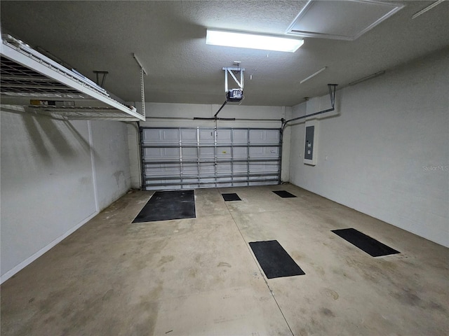 garage featuring a garage door opener and electric panel