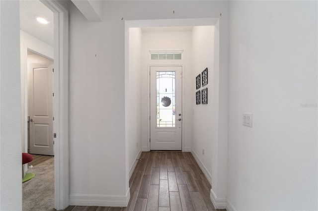 entryway with hardwood / wood-style flooring