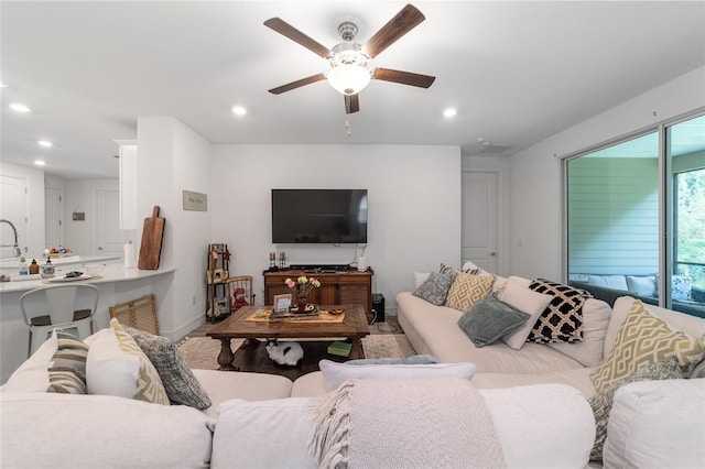 living room with ceiling fan