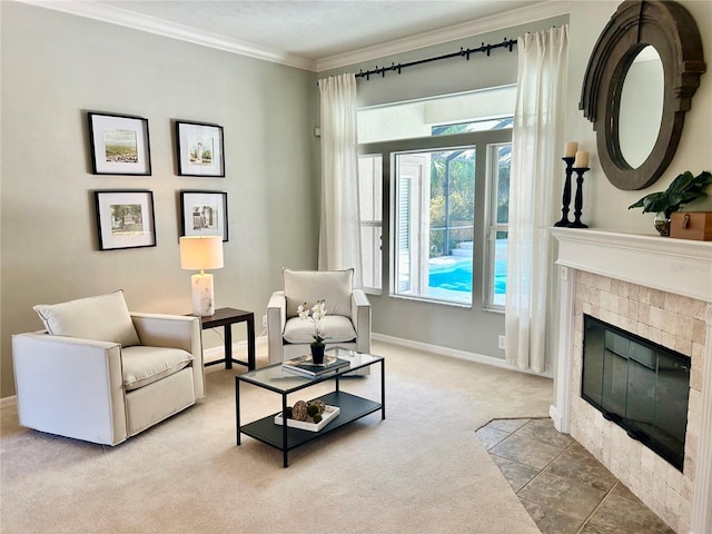 living area featuring carpet, a fireplace, crown molding, and baseboards