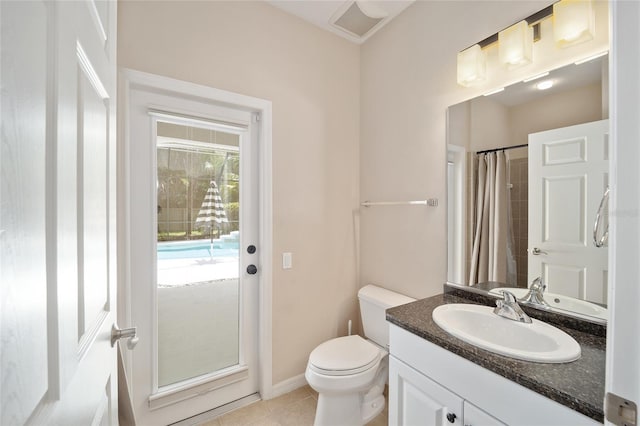 full bath featuring a shower with curtain, visible vents, toilet, vanity, and tile patterned flooring