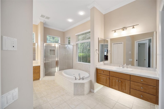 bathroom featuring a garden tub, visible vents, ornamental molding, a shower stall, and vanity