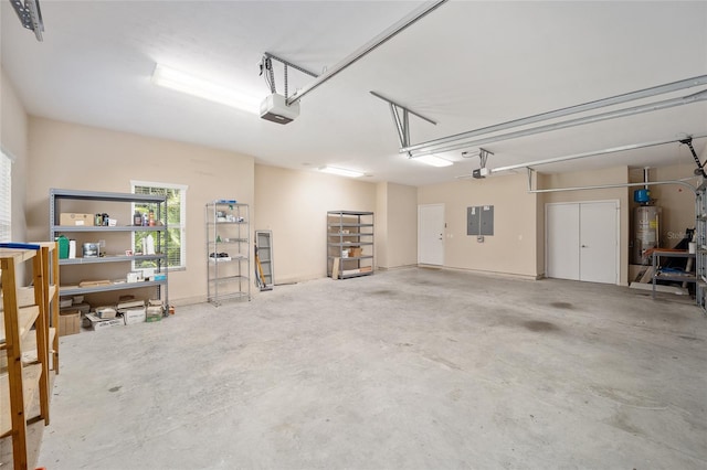 garage featuring electric panel, gas water heater, and a garage door opener